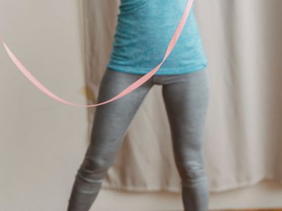 Shadow of a person moving rhythmically on a wall